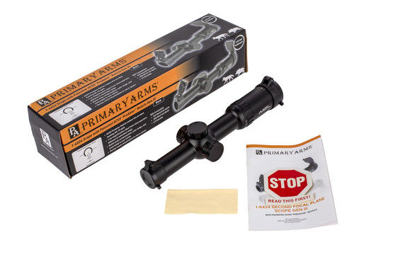 Primary Arms 1-6x24mm SFP rifle scope with ACSS Predator reticle includes a cleaning cloth, manual, and flip-up caps